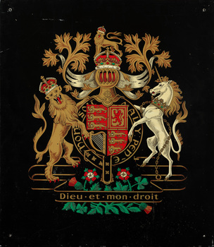 Royal coat of arms painted on a black background - the central shield is flanked by a lion and unicorn, surmounted by the Royal crown with the motto below