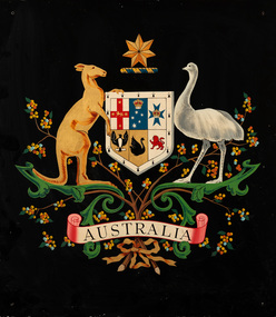Commonwealth coat of arms painted on a black background - the central shield is flanked by a kangaroo and an emu, surmounted by the crest and below is a wreath of golden wattle. Below is a ribbon containing the word AUSTRALIA