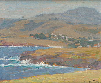 Seascape with waves and shoreline in foreground. There are many buildings and trees  in midground depicting a village and hills in the background.