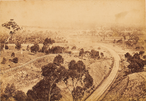 Elevated view of a railway line through the countryside