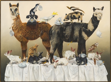 Two alpacas stand rear to rear on top of a table filled with rabbits, a quoll, and a bird. Other animals and a rotary phone can be seen balanced on their backs