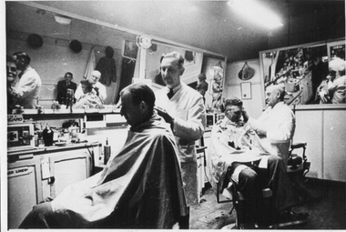 Customers at Sid Lawrie's barber shop in Whitehorse Road 1945-1950 
