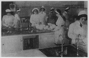 Photograph - School girls learning domestic science, Howard  E. Joyce