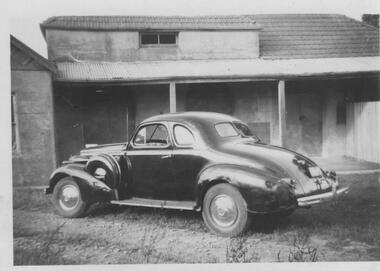 Photograph - Car outside municipal abattoirs