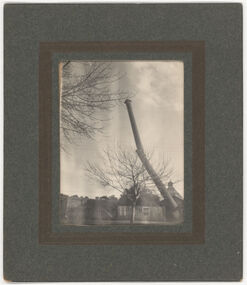 Photograph - Black and white print, Demolition of chimney stack at the old distillery in Barker St south