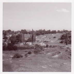 BLACK AND WHITE PHOTOGRAPH PANORAMIC VIEW OF CLUNES. PHOTO TAKEN FROM SPOT WHERE GOLD WAS FIRST DICOVERED LOOKING SOUTH TOWARDS ANLICAN CHURCH.