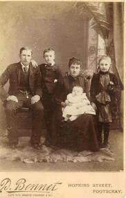 SEPIA  PHOTOGRAPH OF A FAMILY GROUP