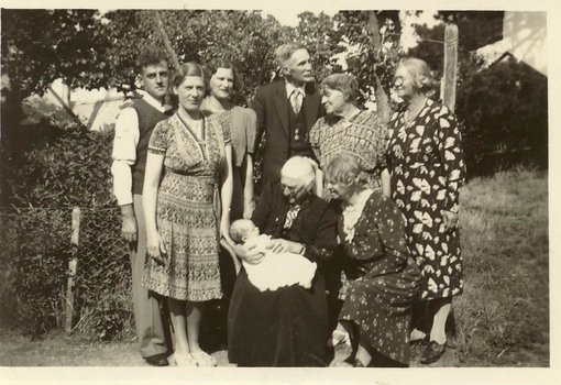 BLACK & WHITE  PHOTOGRAPH OF A FAMILY GROUP, INCLUDING LAURA HUDSON [AGE 93 YEARS] HOLDING HER GREAT-GRAND DAUGHTER, DEANNE C. TAYLOR [AGE 6 WEEKS]