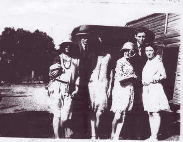 COPIES OF PHOTOGRAPHS:-GROUP OF SIX PEOPLE C1925 AND CHILD IN A PRAM, C1941, GRAND-CHILDREN OF EDWIN RYAN, A POLICE INSPECTOR.