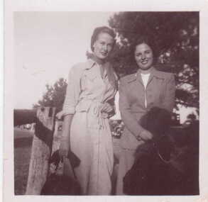 SMALL BLACK & WHITE PHOTOGRAPH OF SHIRLEY JAMES, ON LEFT, AND JOAN PEAKE [NEE EASEY].