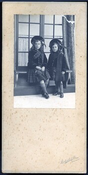 Image of two young girls in the national costume of Scotland