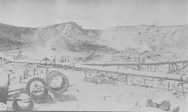 Pipes in open cut mine.
