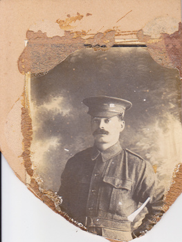 Studio portrait of soldier in Australian Infantry Forces uniform.