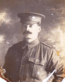 Studio portrait of solder in Australian Infantry Forces uniform.