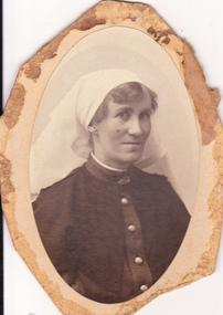Studio portrait of nurse in the Australian Army Service.