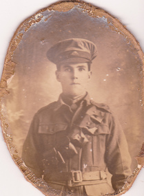 Studio portrait of solder in Australian Infantry Forces uniform.