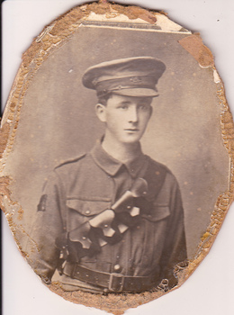 Studio portrait of solder in Australian Infantry Forces uniform.