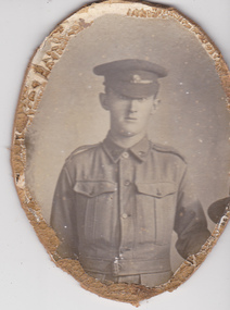Studio portrait of soldier in Australian Infantry Forces uniform.