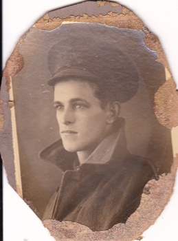 Studio portrait of soldier in Australian Infantry Forces uniform.