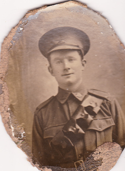 Studio portrait of soldier in Australian Infantry Forces uniform.
