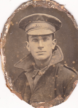 Studio portrait of soldier in Australian Infantry Forces uniform.