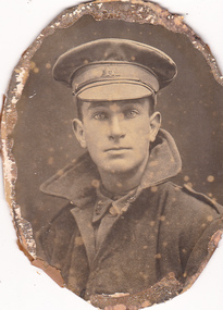Studio portrait of soldier in Australian Infantry Forces uniform.