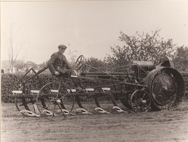 Photograph, Samuel George CAHILL, Moline tractor with May and Miller Plough, n.d