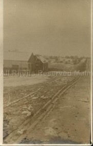 Postcard (Item), "Postcard Snow In Mollison St, Blacksmith Shop, Kodak", Malmsbury c1920