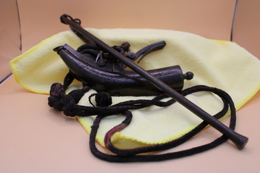 Weapon - Gunpowder flask, Metal flask and rammer, c1910