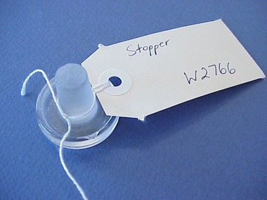 Stopper, Glass stopper with circular top and burred stem