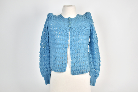 front view of blue knitted children's cardigan with three buttons