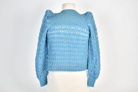 back view of blue knitted children's cardigan