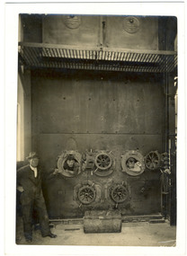 Photograph, [View of boilers being cleaned]