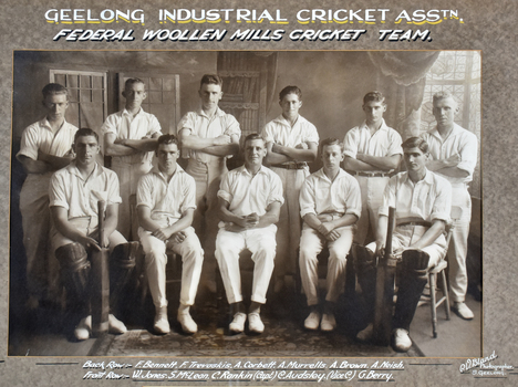 Group portrait of 11 white men in cricket uniforms