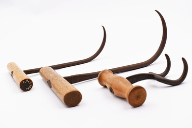 These are examples of the old hay hooks with wooden handles used on the  farm we have in stock.