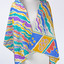 front view of a vibrant coloured scarf draped over a mannequin, colours include turquoise, purple, yellow, blue and orange.