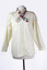 front view of long sleeve cream shirt with floral printed neck tie