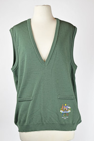 front view of green vest with emblem bottom right corner