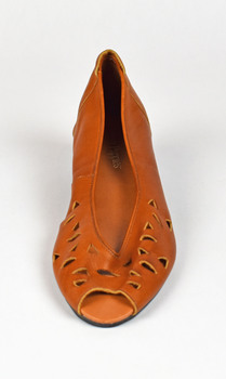 tan sandle with triangle shaped holes and open toe shown from the front