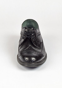 front view of shiny black shoe