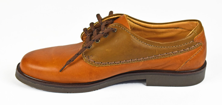 inside view of tan shoe with brown lace