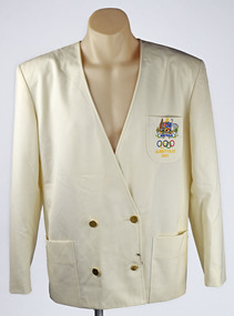 front view of cream jacket with gold buttons and logo on pocket