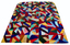front of multi-coloured unfolded quilt with geometric pattern