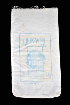 front of calico bag showing yellow and blue graphics and text