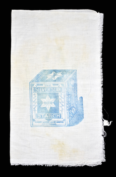 calico bag with blue graphic of a cube with text