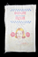 calico bag with red, yellow and blue graphic and text, graphic shows woman wearing a bakers hat