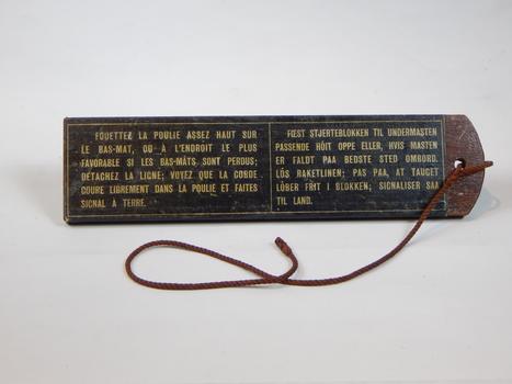 Instructions to attach continuous hawser from shipwreck to shore, 4 languages.
