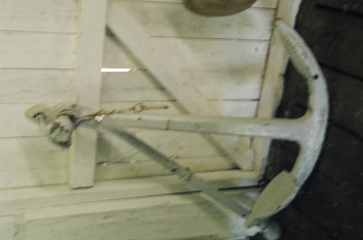 Iron anchor, Admiralty pattern, with folding arm and locking pin. 3 flukes. Painted grey
