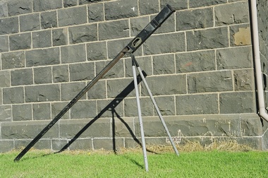 Free standing rocket machine for shore to shipwreck rescue. Adjustable metal frame to support rocket launch to carry a light line to a shipwreck offshore.
