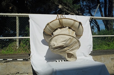 Shore to shipwreck rescue, survivor sits in canvas breeches and is hauled to shore via continuous line from shipwreck to shore.